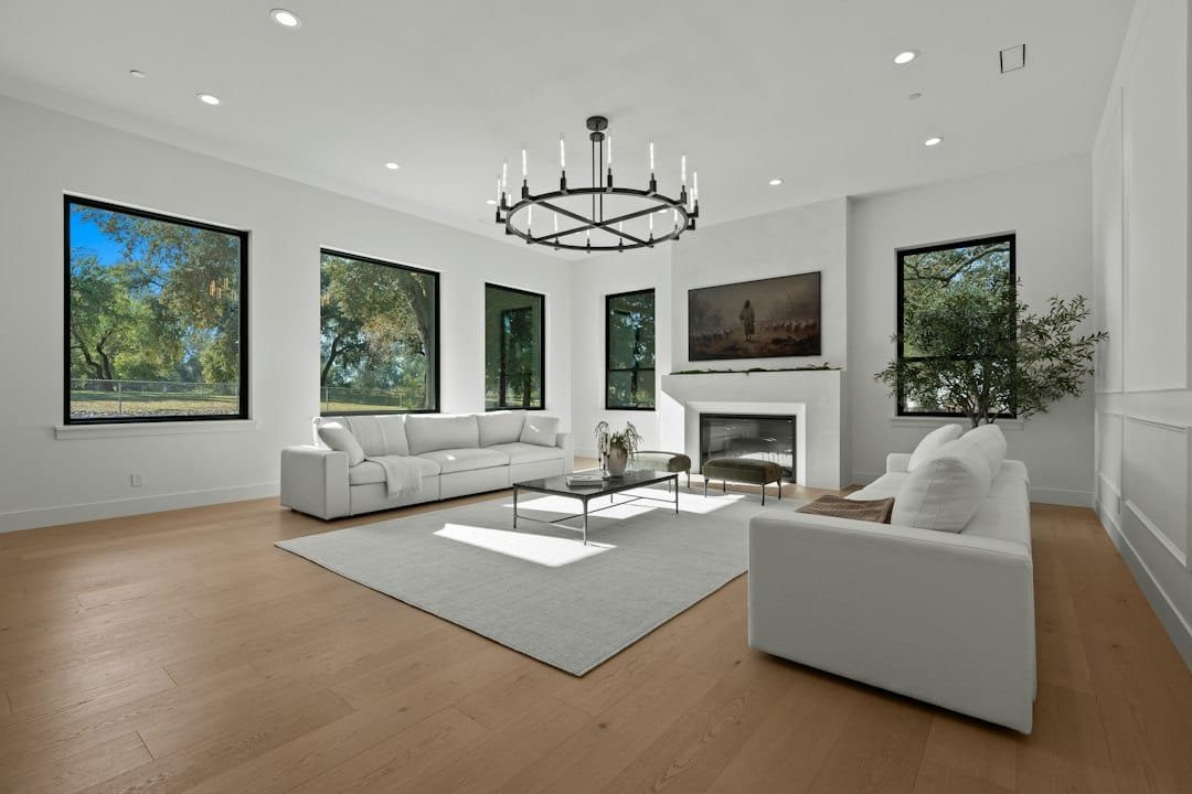 Bright Vaughan living room with warm wide-plank engineered hardwood flooring