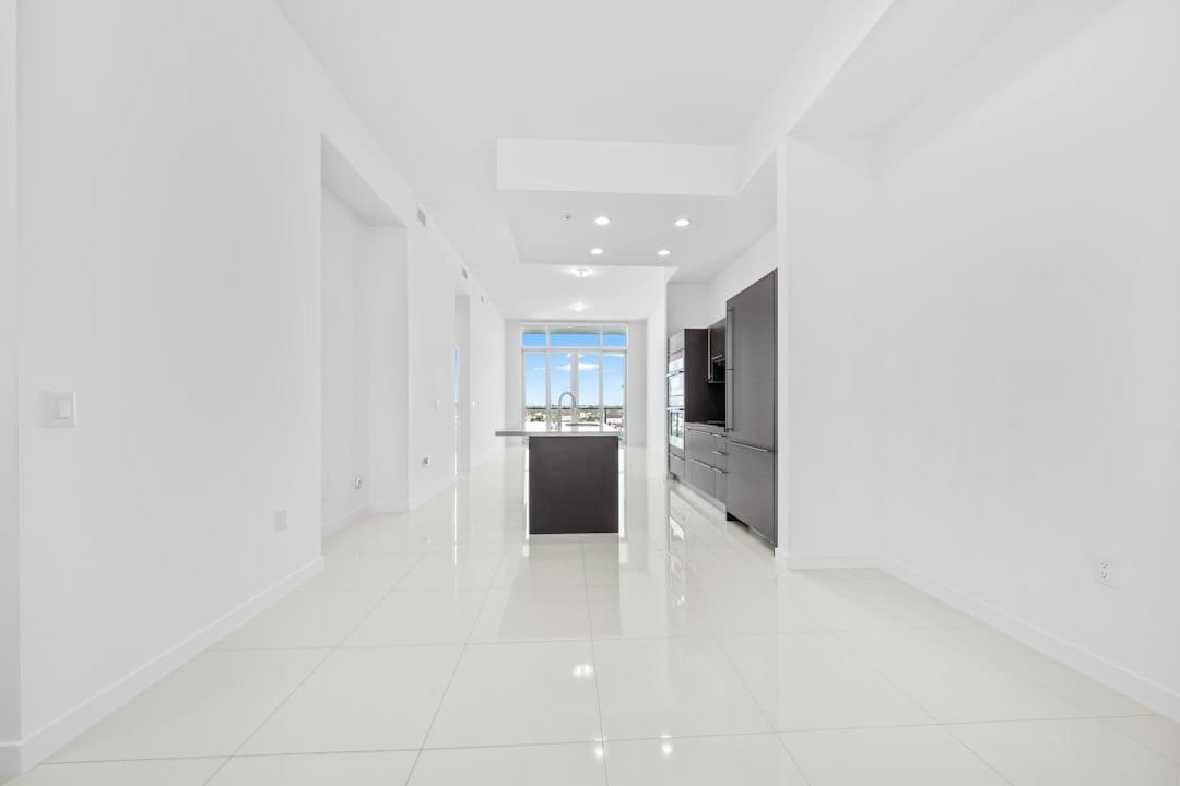 Modern apartment entry with porcelain tile floor